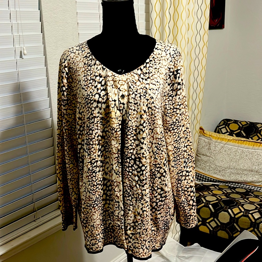 Cardigan brown tan and black print.